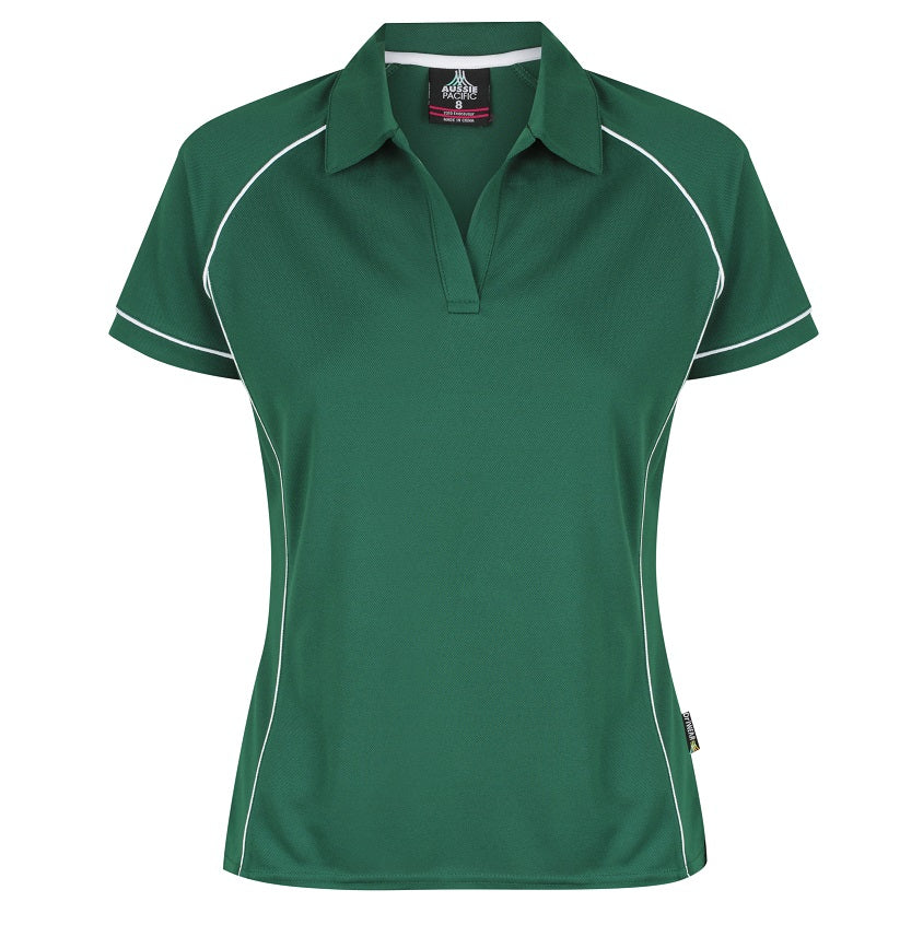 A green and white Aussie Pacific Endeavour ladies polo shirt with contrast piping at the raglan, side panel, and sleeve cuff, displayed on a plain background.