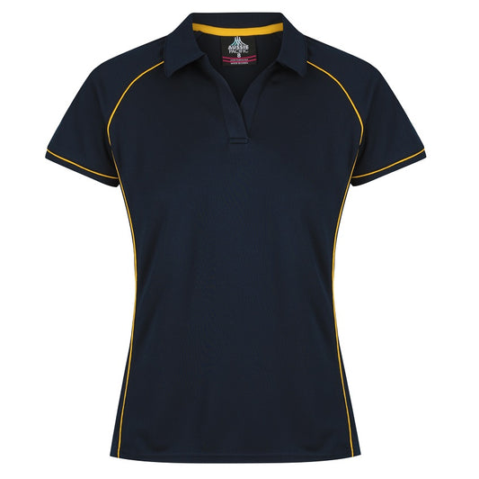 A navy blue and gold colored Aussie Pacific Endeavour ladies polo shirt with contrast piping at the raglan, side panel, and sleeve cuff.