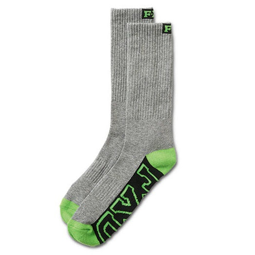 A pair of FXD long work socks in gray with green accents and a black logo on the ankle area.