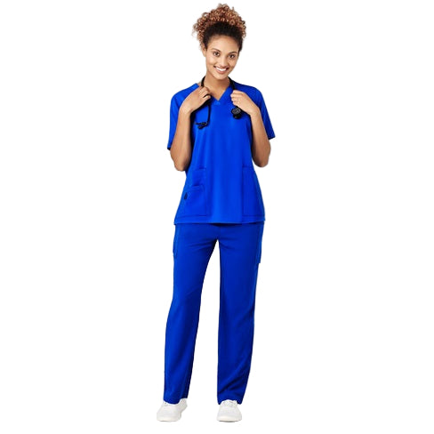 A woman modeling a blue Bizcare medical scrub set with multiple pockets and a straight leg design.