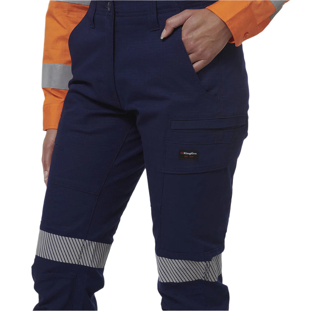 Navy work pants with orange and reflective elements on a white background