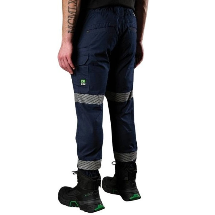 Navy work pants with reflective stripes worn by a person on a white background