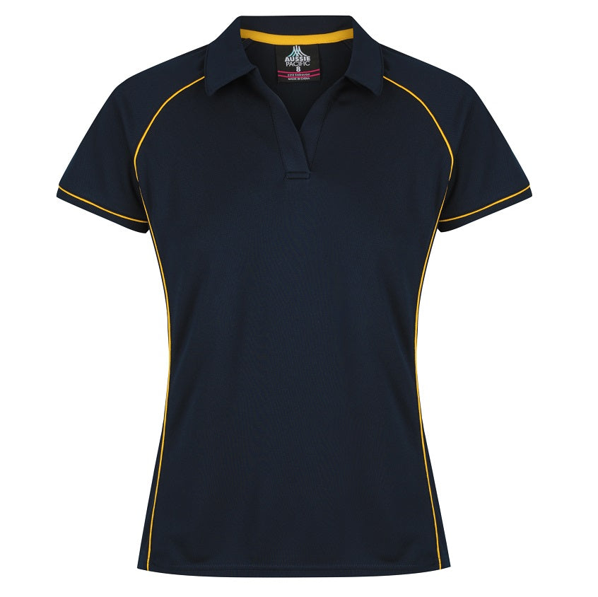 A navy blue and gold colored Aussie Pacific Endeavour ladies polo shirt with contrast piping at the raglan, side panel, and sleeve cuff.