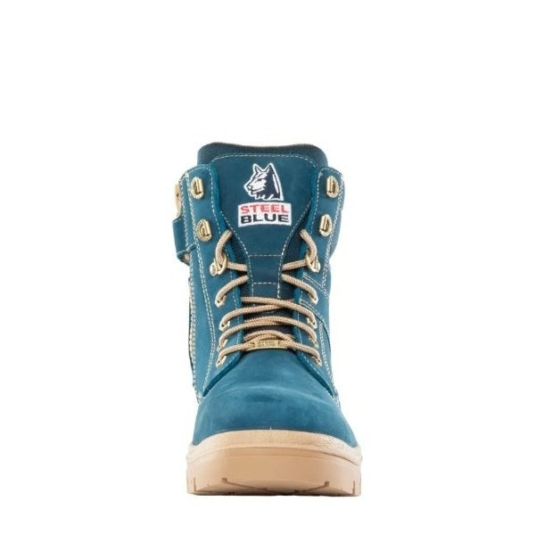 Blue boot with tan laces and sole on a white background