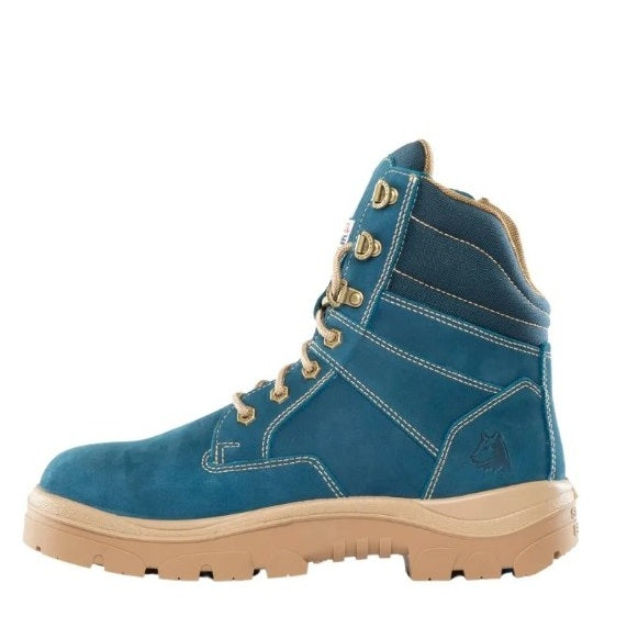 Blue work boot with tan sole on a white background