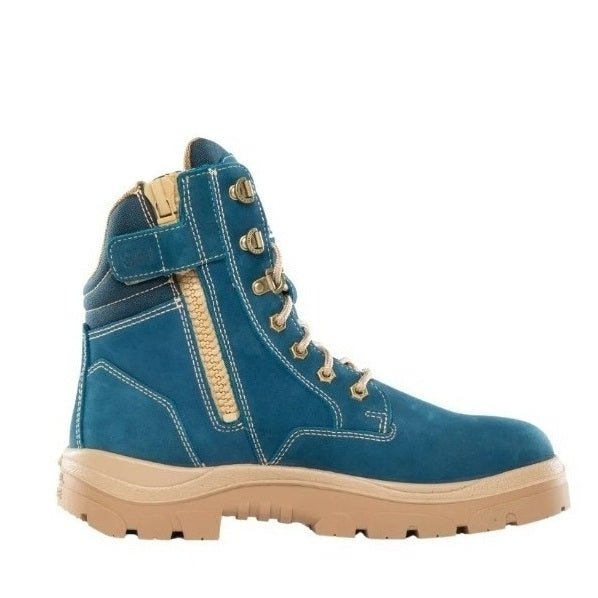 Blue boot with beige sole on a white background