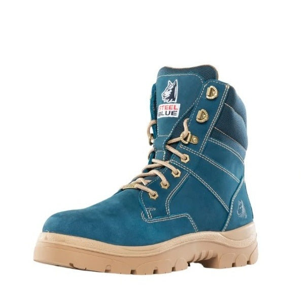 Blue work boot with tan sole on a white background