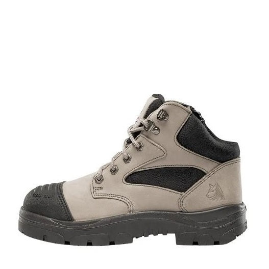 Tan and black hiking boot on a white background