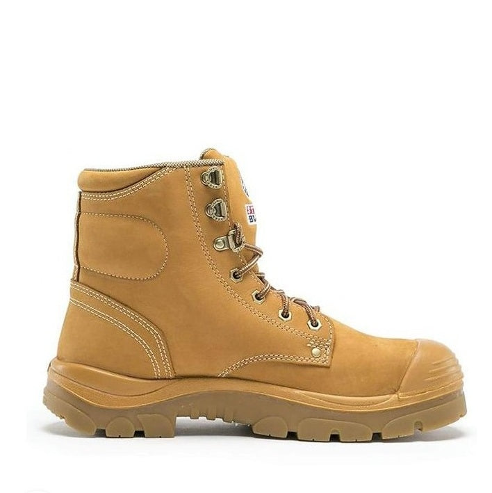 Tan work boot on a white background
