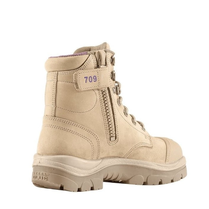 Beige boot with '709' branding on a white background