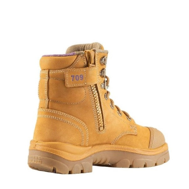 Yellow work boot with visible brand number on a white background