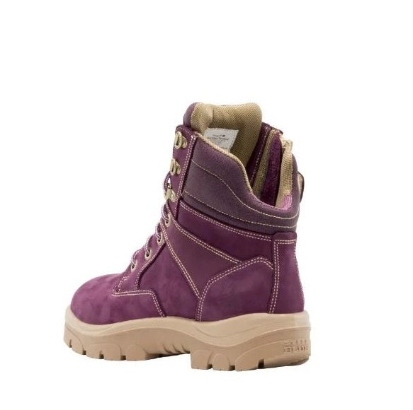 Purple boot with beige sole on a white background