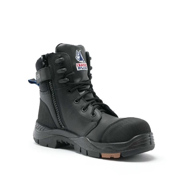 Green boot with black sole on a white background