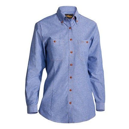 Blue denim shirt with brown buttons on a white background