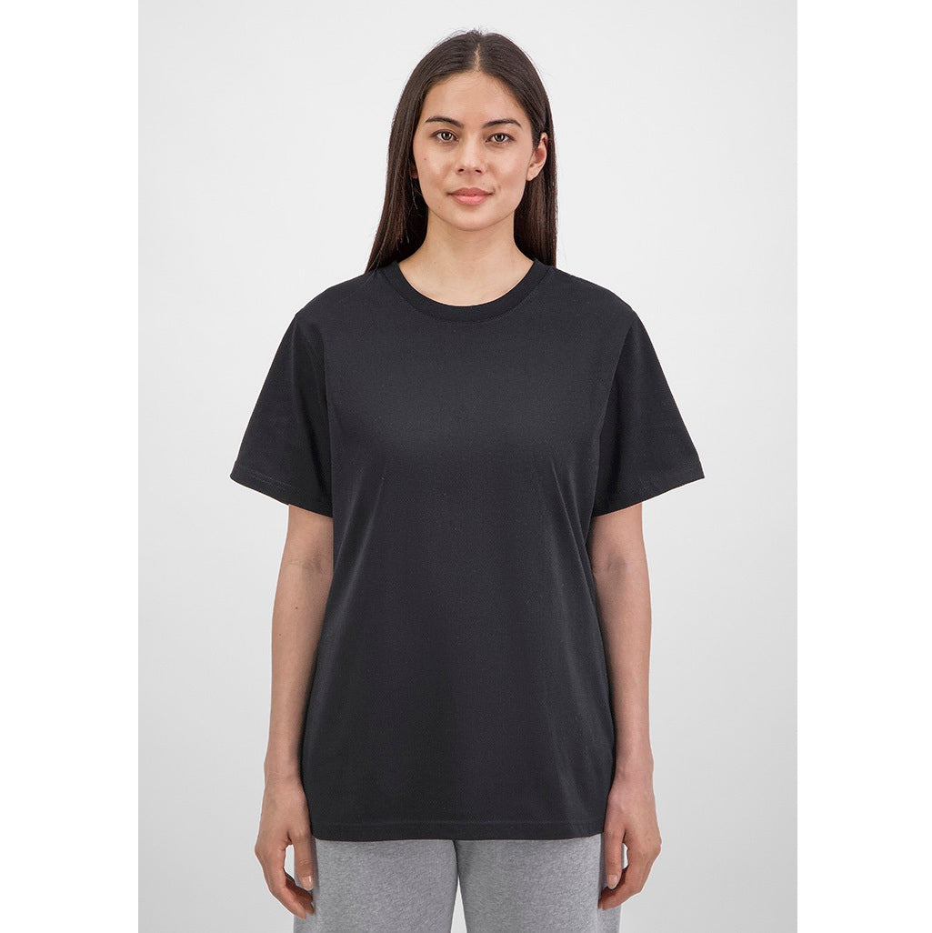 Person wearing a black t-shirt on a white background