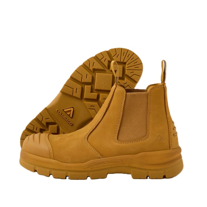 Pair of tan boots with Colorado brand logo on a white background