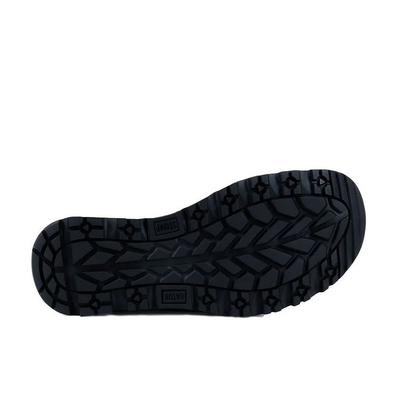 Black sole of a shoe with tread pattern on a white background