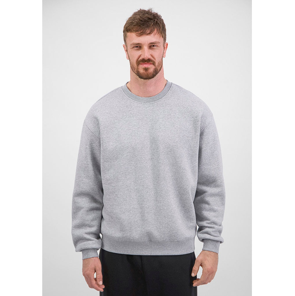 Man wearing a gray sweatshirt on a white background