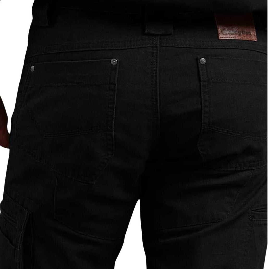 Close-up of black cargo pants with a brand label on a white background