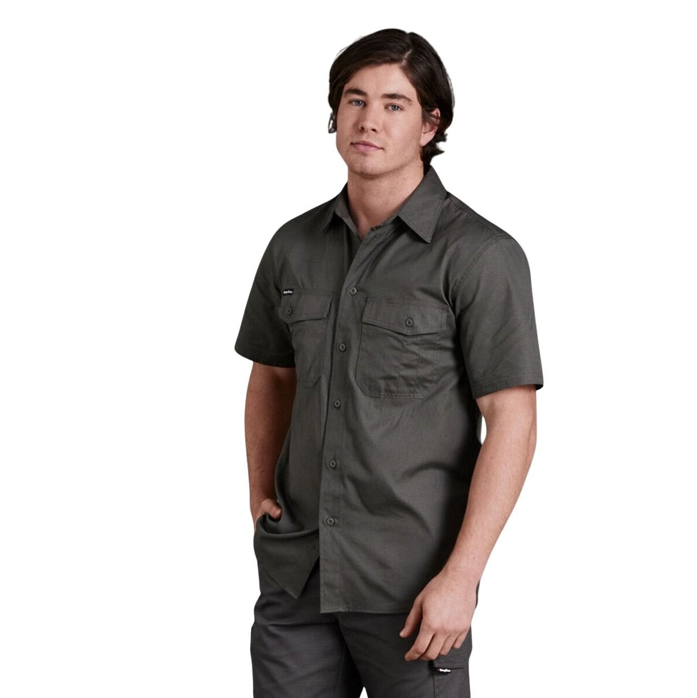Man wearing a dark gray short-sleeve shirt on a white background