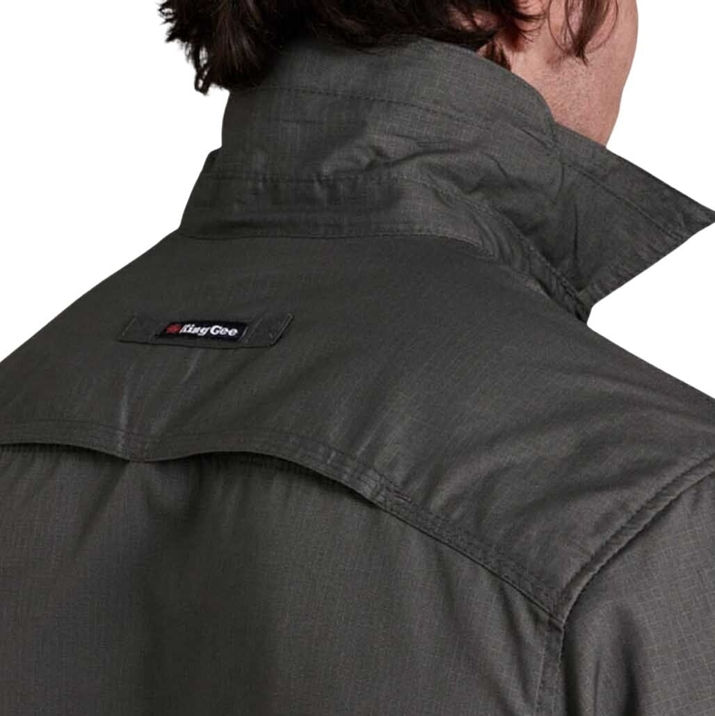 Dark gray jacket with a brand logo on the chest against a white background