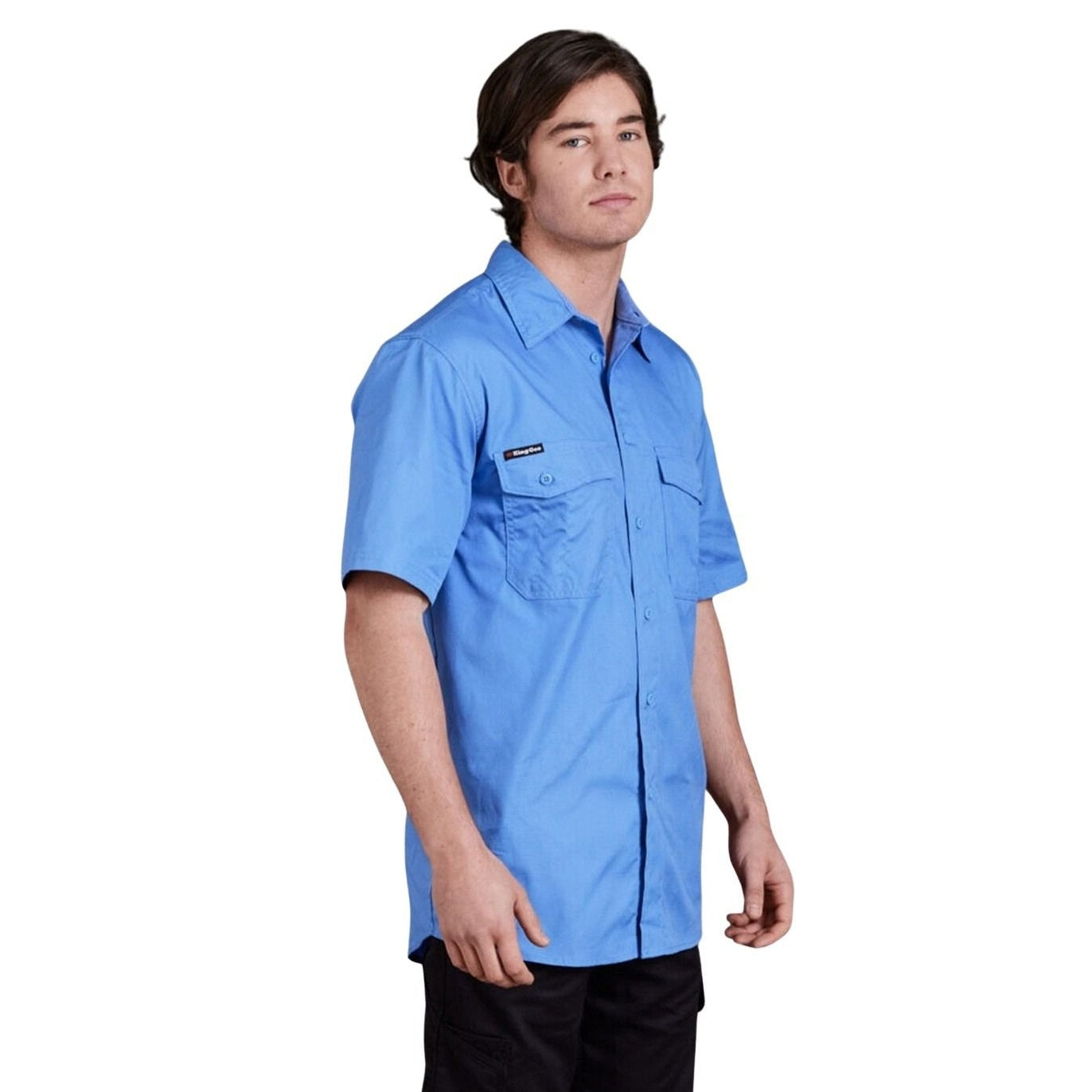 Man wearing a blue short-sleeve shirt on a white background
