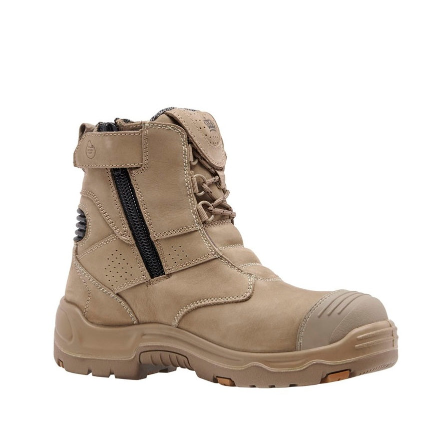 Tan boot with a black zipper on a white background