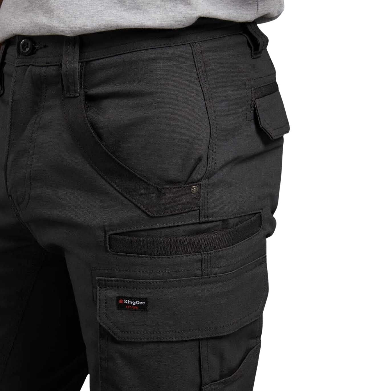 Black cargo pants with a visible brand label on a white background