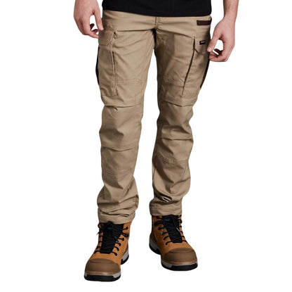 Beige pants worn by a person on a white background