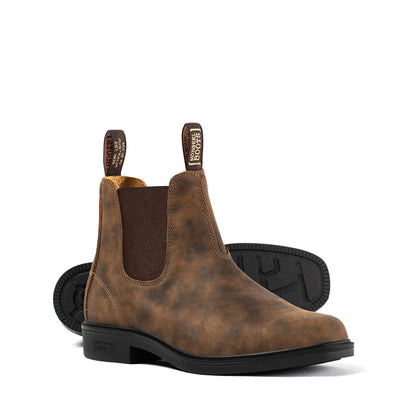 Brown leather Chelsea boots with black soles on a white background K92075