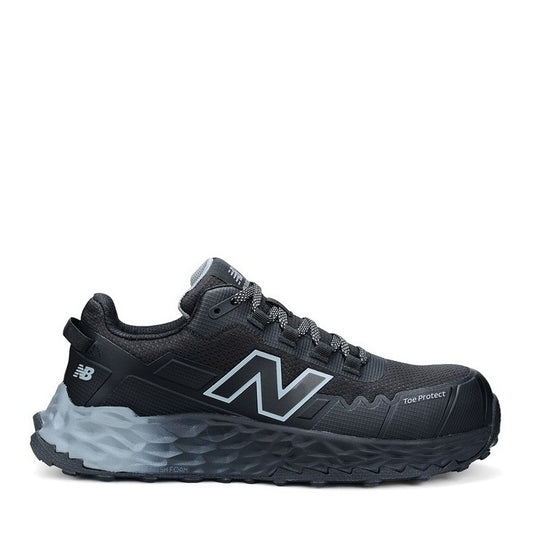 Black work shoe with New Balance logo on a white background