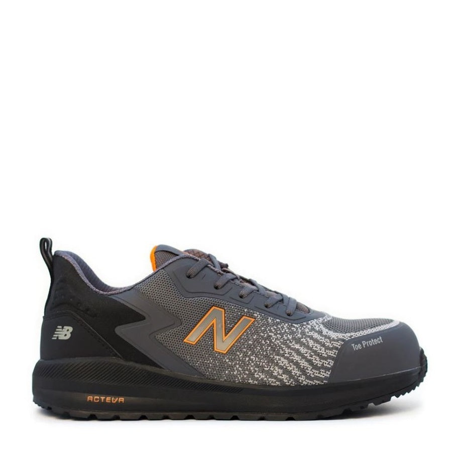 Grey and black with orange accents sneaker Slip resistant airport friendly  New Balance MIDSPWR Speedware Composite Safety Joggers