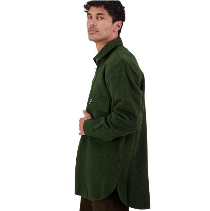 Man wearing a green coat on a white background