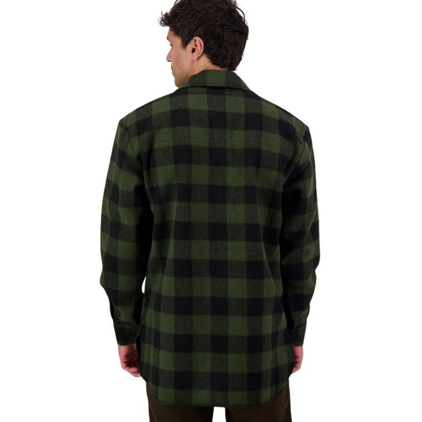 Person wearing a green and black checkered shirt on a white background