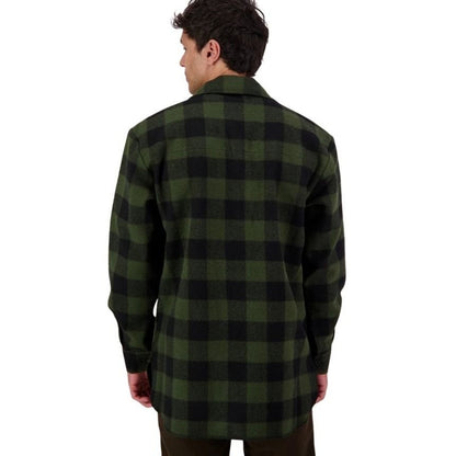 Person wearing a green and black checkered shirt on a white background