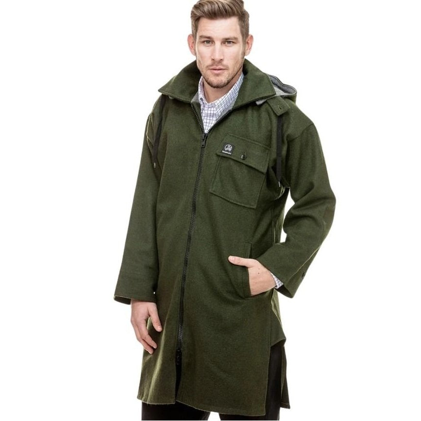 Man wearing a green coat on a white background