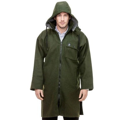 Man wearing a green raincoat on a white background