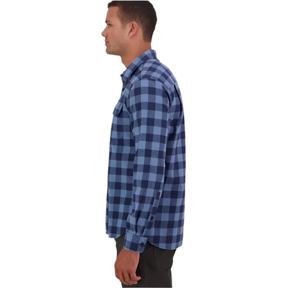 Person wearing a blue checkered shirt on a plain background