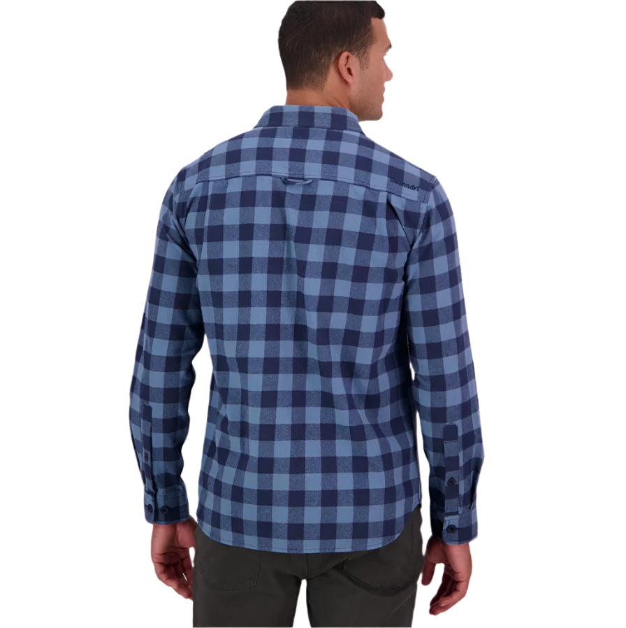 Person wearing a blue checkered shirt against a plain background