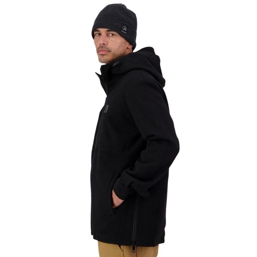 Man wearing a black jacket and beanie on a white background