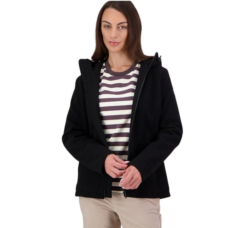 Woman wearing a black hooded jacket over a striped shirt on a white background