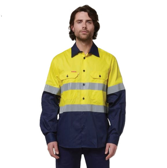 Person wearing a high-visibility yellow and navy work shirt on a white background