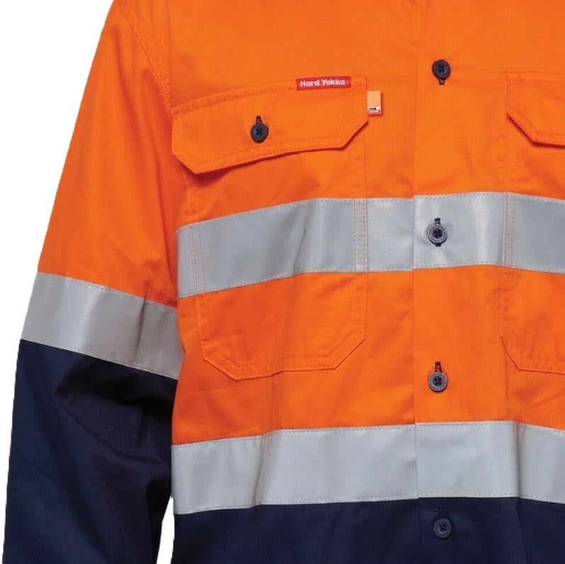 Orange and navy high-visibility work shirt with reflective stripes on a white background