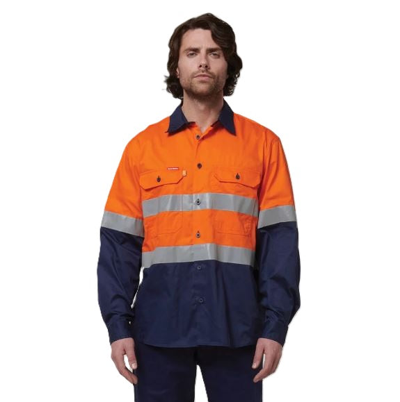 Person wearing a high-visibility orange and navy work shirt on a white background