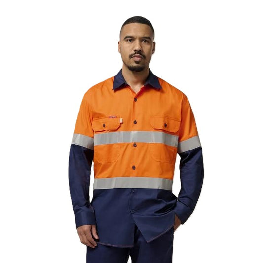 Man wearing an orange and navy high-visibility work shirt on a white background