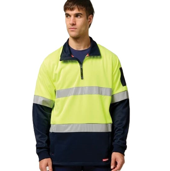Person wearing a high-visibility safety jacket with reflective stripes on a white background