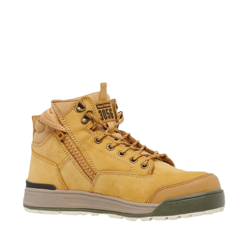 Yellow hiking boot with brand logo on a white background