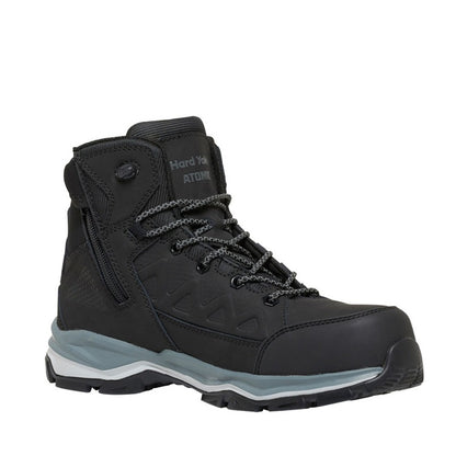 Black hiking boot with a white sole on a white background