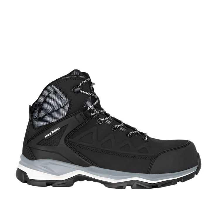 Black hiking boot with gray sole on a white background