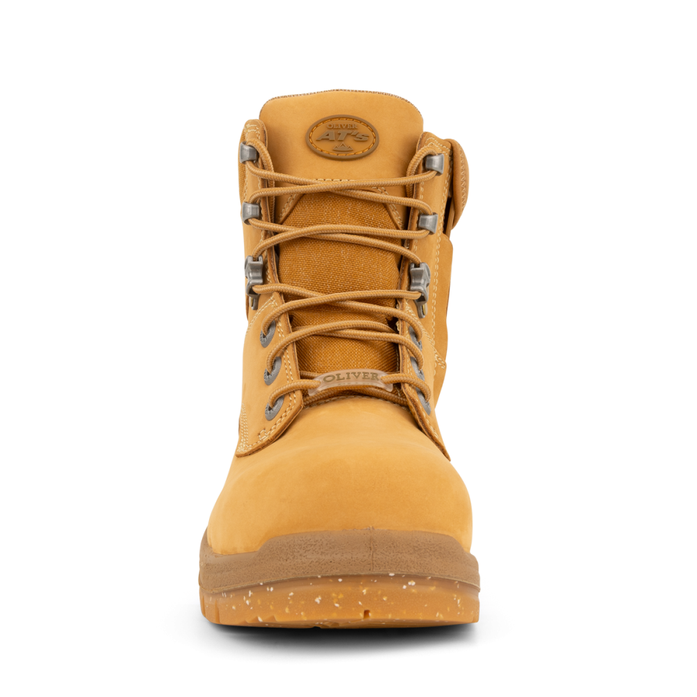 Yellow boot with laces on a white background
